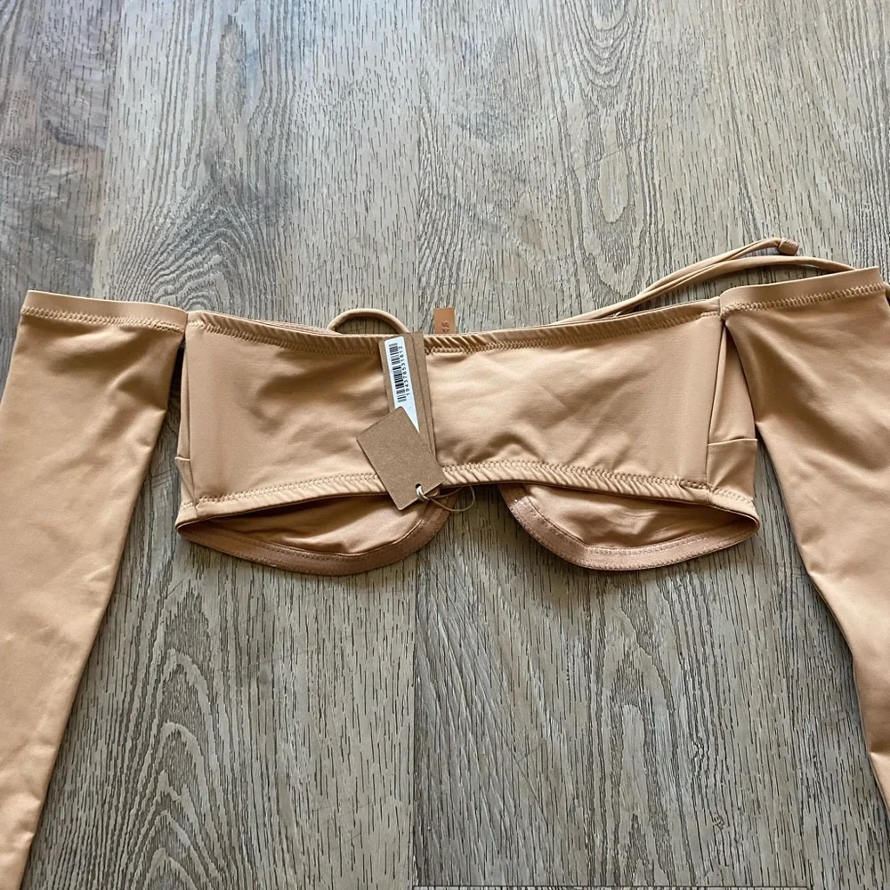 Skims Recycled swim long sleeve bikini top in Orche NWT